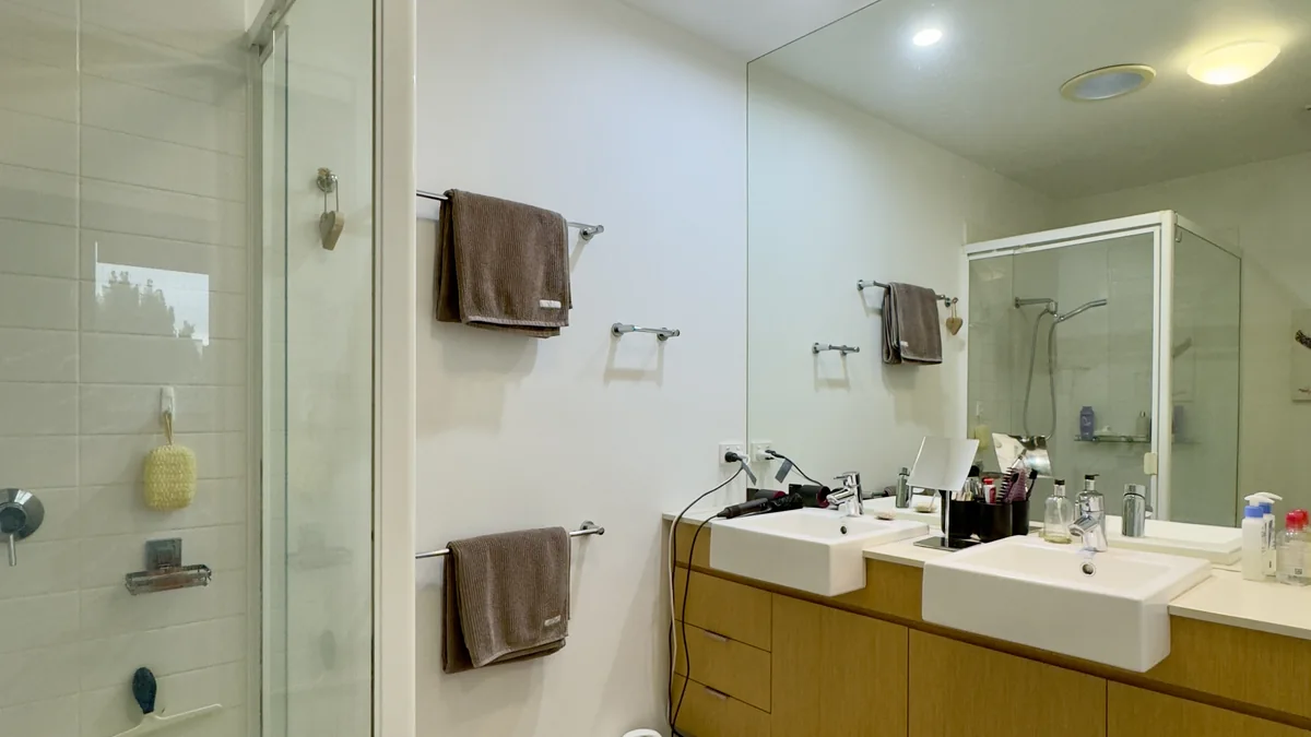 Shower and fittings in an apartment bathroom